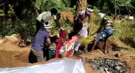 Video footage shows the body of Janki Sori being forcibly exhumed