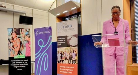 Chibuzor speaking at an event.