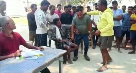 Footage shows one of the Christians being assaulted outside the police station on 23 October
