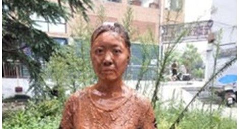 Gangsters poured mud on a member of Pastor Haos church during a gathering in 2017. Credit: RFA
