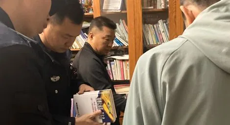Officers raid the home of Pastor Sun Cong of Zion Church.