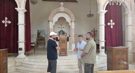 Commander Al-Sawadi of the Syrian National Army at the St. Thomas Syriac Orthodox Church
