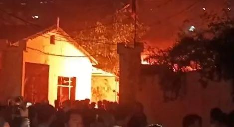 Video footage circulated on social media shows the police station in Madyan on fire.