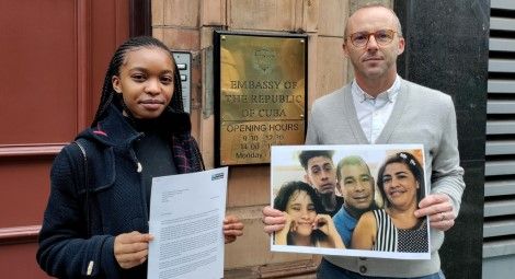 CSW staff hand in the petition at the Cuban Embassy in London. Credit: CSW