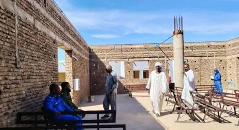 Members of the Coptic community ofWad Diab Al Gaba in their partially reconstructed church building