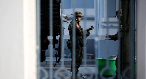 Myanmar soldiers are seen inside City Hall in Yangon, Myanmar. 1 Feb 2021. Credit: REUTERS/Stringer