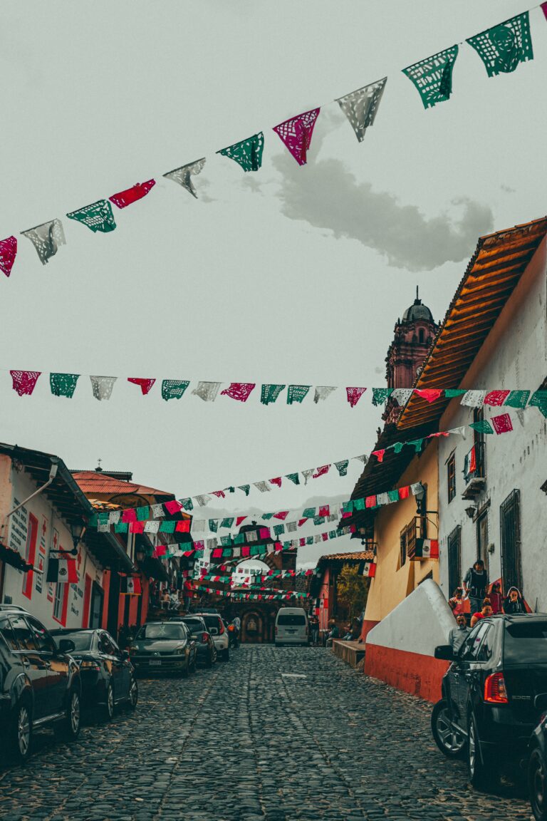 A street with flags flying in Michoacán, Mexico.