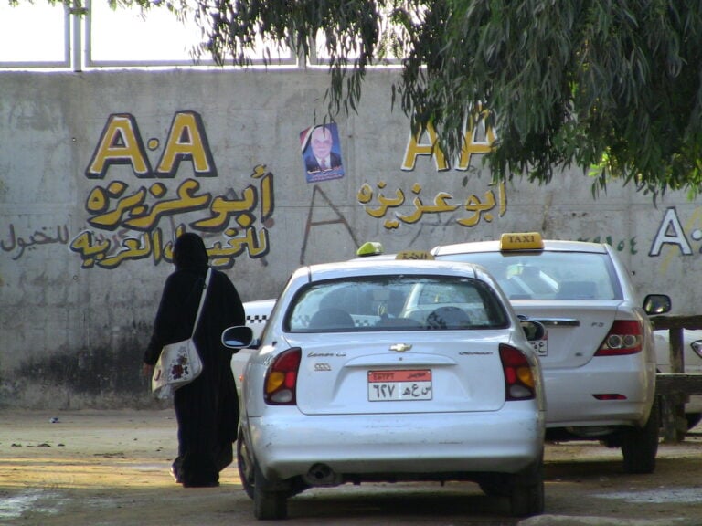 Taxis, writing, hijab
